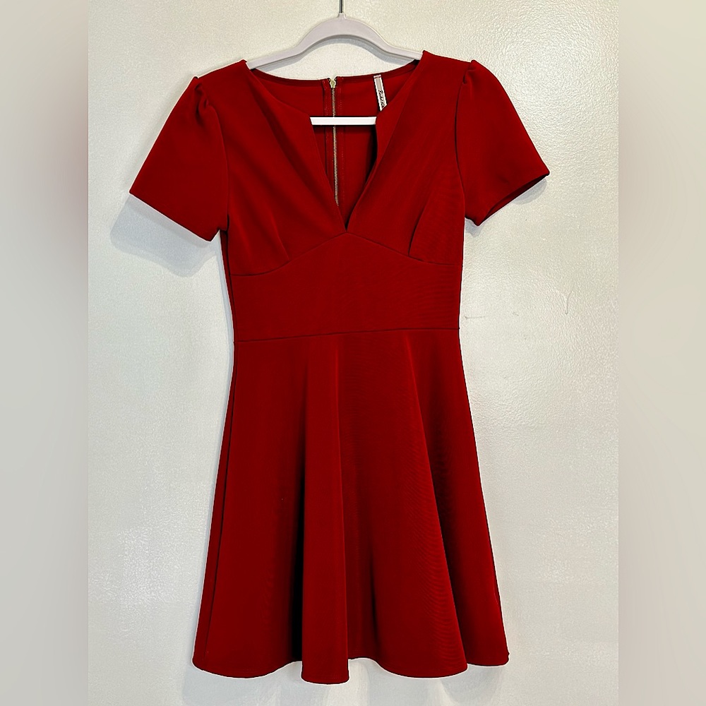 NWT Rachel Kate mini dress. Beautiful dress and color.